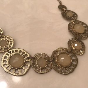 Feminine gold statement necklace